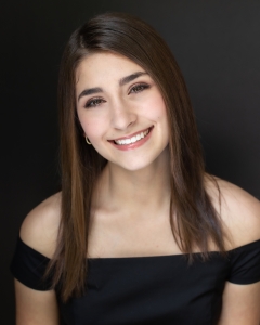 Alana is a member of the Gibbs High School Class of 2023, and has been cultivating her passion for theatre since her early years. She received her training from notable instructors such as Nick Orfanella, Caroline Carter, and Trish Grunz. Alana takes weekly acting lessons with Nick Orfanella at Tota Music and Theatre Conservatory, where she has been learning from him for the past six years. In addition to being coached on monologues in her lessons, she has also been cast in his shows. Most recently, she played Julia Sullivan in The Wedding Singer, where she had the opportunity to work with him one-on-one. Alana also takes acting classes at the Pinellas County Center for the Arts during her school day, where she studies various acting techniques such as Uta Hagen and Laban movement. She also receives hand-picked monologues and scenes to help her prepare for college auditions. Alana is a member of the National Honors Society, Thespian Honors Society, and Mu Alpha Theta Honors Society. She is also a member of the Ambassadors of Sound at Tota Conservatory and has received Critics Choice awards for her solo dance and her portrayal of Best Actress in a One-Act. In October 2022, she was chosen as Ambassador of the month, and after being inducted as a member of the NHS in August of 2022, she was elected vice president. She has also served as the publicist for the past year, where she helped promote the school's honors society and various performance and volunteer hour opportunities. Additionally, she serves as the dance captain and helps choreograph various numbers and teach choreography to younger students. 
